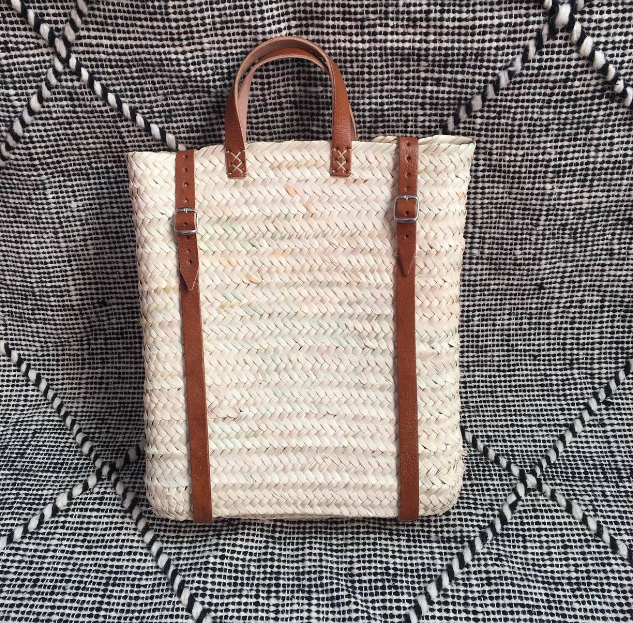 Straw backpack with leather strap